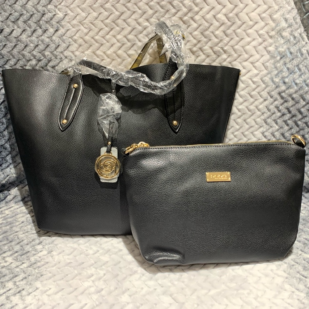 Reversible BEBE purse with a make up inside